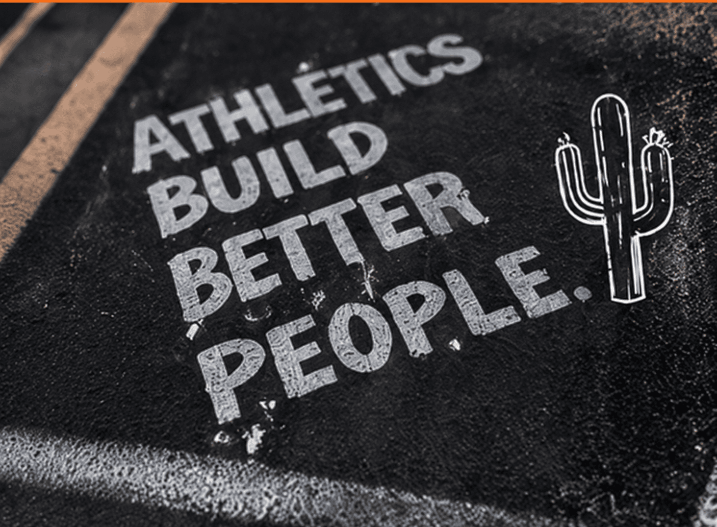 Athletics build better people. Stencil-style text painted on a running track's asphalt, with a small cactus graphic.